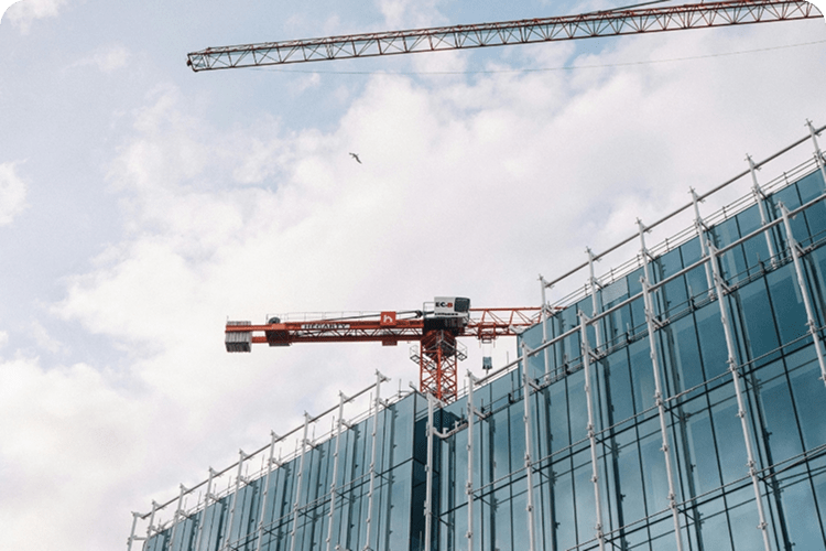 Building under construction with a crane