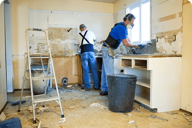 Workers renovating a kitchen